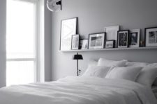 12 a minimalist bedroom can accomodate a gallery wall on a ledge to give it a sleek look