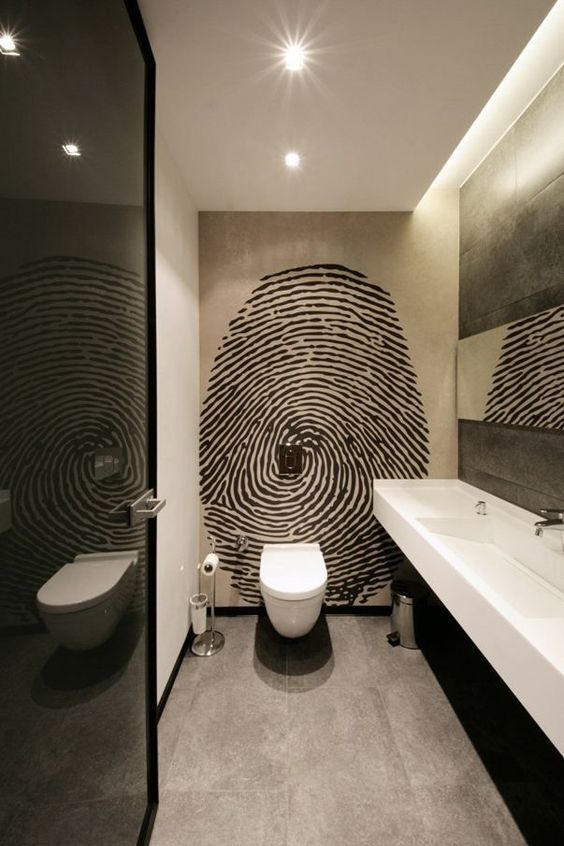 an oversized graphic fingerprint wall art is sure to add a personalized touch to the masculine space