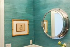 13 an ocean-inspired bathroom with wainscoting that protects the wallpaper and makes the bathroom feel vintage
