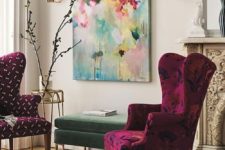 15 a couple of very bold and colorful upholstered wingback chairs and a bold artwork make the nook vibrant
