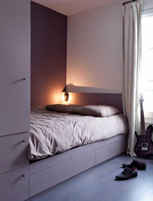A smart built in unit with storage compartments and a bed is a great idea to rock in a tiny room