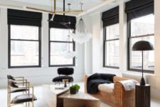 15 black touches here add interest and Roman shades in black are among these eye-catchy items