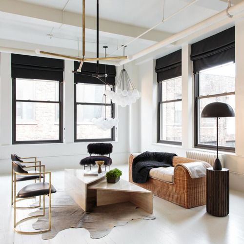 black touches here add interest and Roman shades in black are among these eye-catchy items