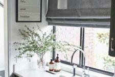 16 grey Roman curtains are a perfect fit for a Scandinavian kitchen