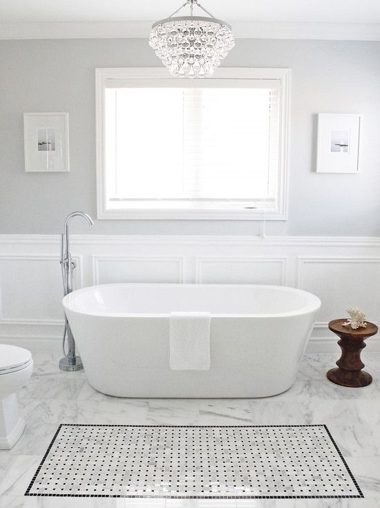 protect the walls of your bathroom next to the bathtub with elegant wainscoting, which is ideal for a glam space
