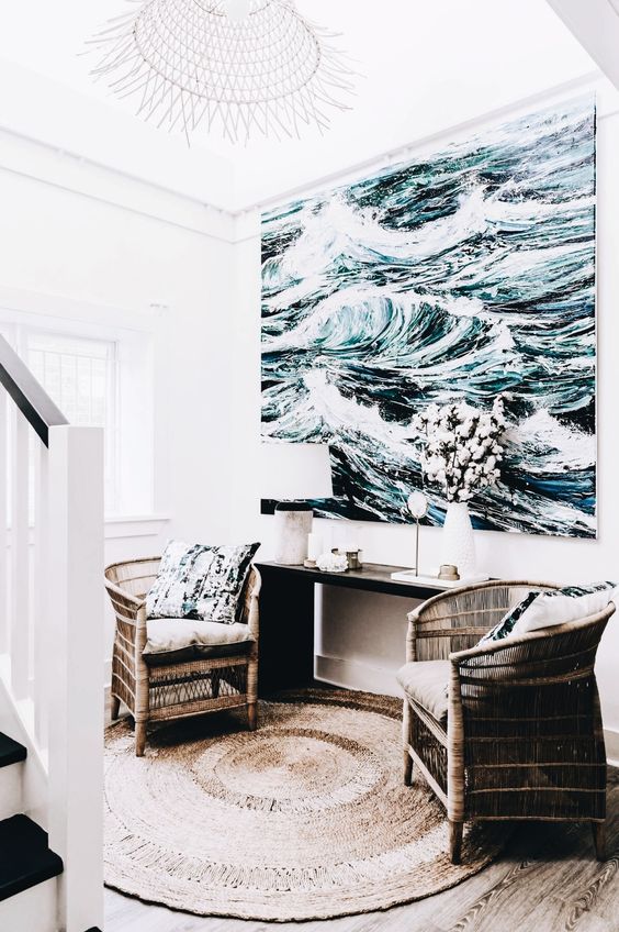 A large scale artwork takes over this small nook and makes it sea like and refreshing