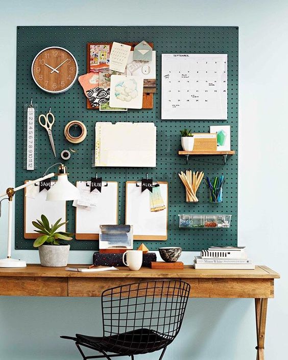 a teal pegboard wall is a practical and cool idea to rock in your home office