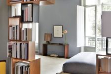 18 box-shaped shelves partly covering the entrance to the bedroom is a nice solution