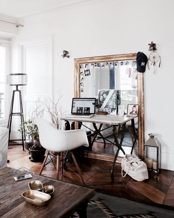 if you feel glam, go for an oversized vintage-framed mirror, your may also use it as a memo board