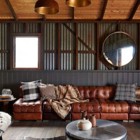 a long sectional sofa in various shades of brown is great for an industrial and rustic space