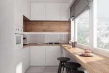 21 a sleek minimalist kitchen with a breakfast windowsill space