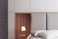 21 hidden storage cabinets and even nightstands that can be hidden back in the wall