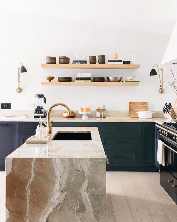modern wooden shelves and eye-catchy stone surfaces make this kitchen very stylish