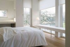 21 white semi sheer Roman shades will help to keep privacy in the bedroom and don’t spoil the harmony of the room