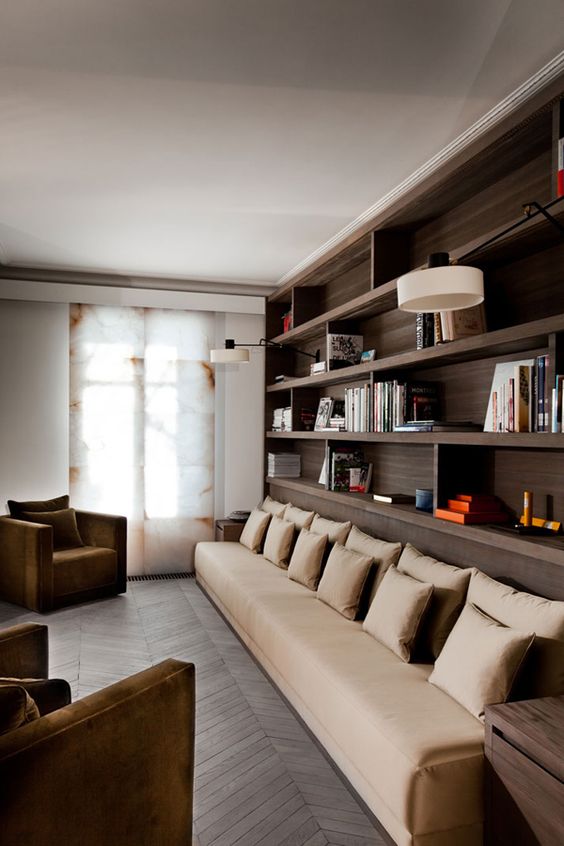 a beige long sectional sofa perfectly fits an extra long but narrow space and its color is very chic