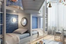 22 a unique ocean-inspired kids’ room with a gorgeous boat bunk bed