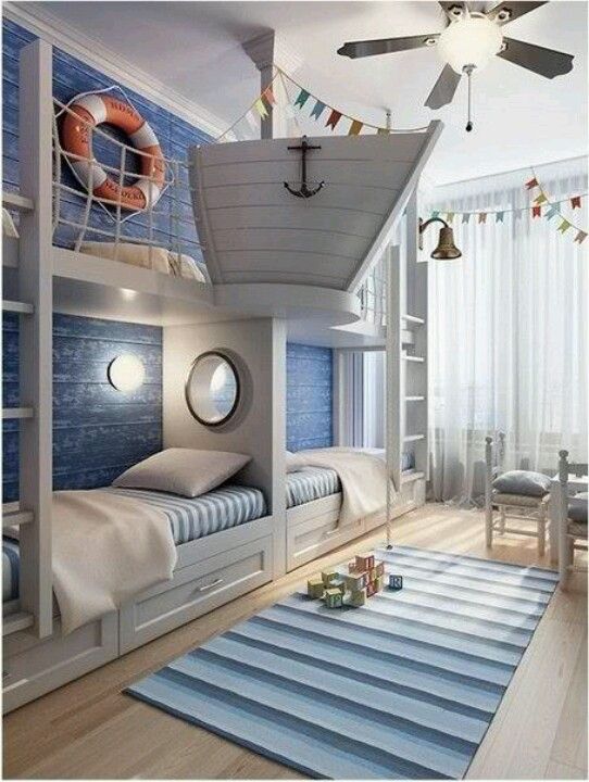 A unique ocean inspired kids' room with a gorgeous boat bunk bed