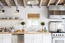 22 reclaimed weathered wooden ceiling with beams brings texture and interest to the usual kitchen