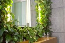 24 a living wall with a sink next to it will make you feel washing outdoors