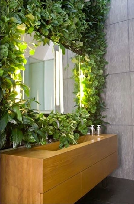 a living wall with a sink next to it will make you feel washing outdoors