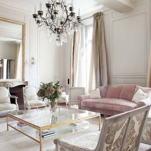 a vintage chandelier and some refined chairs create a fantastic ambience