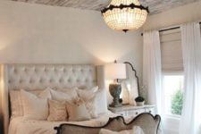 26 a rustic shabby chic wooden ceiling of reclaimed wood adds texture and interest