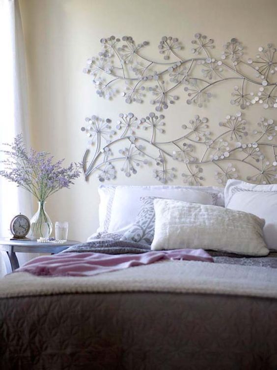 a gorgeous metal florla-inspired screen is a wonderful idea for a girl's bedroom