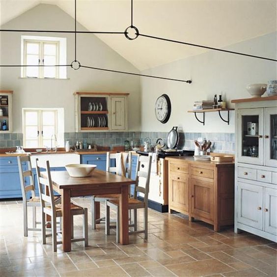 traditional kitchens also look nice with freestanding cabinets and it's easy to wash under them