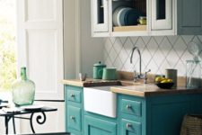 two-toned free-standing kitchen cabinets comprise two of the hottest kitchen decor trends in one