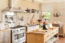 various freestanding kitchen cabinets with metal countertops make the kitchen look airy and lightweight