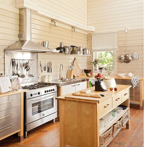 various freestanding kitchen cabinets with metal countertops make the kitchen look airy and lightweight