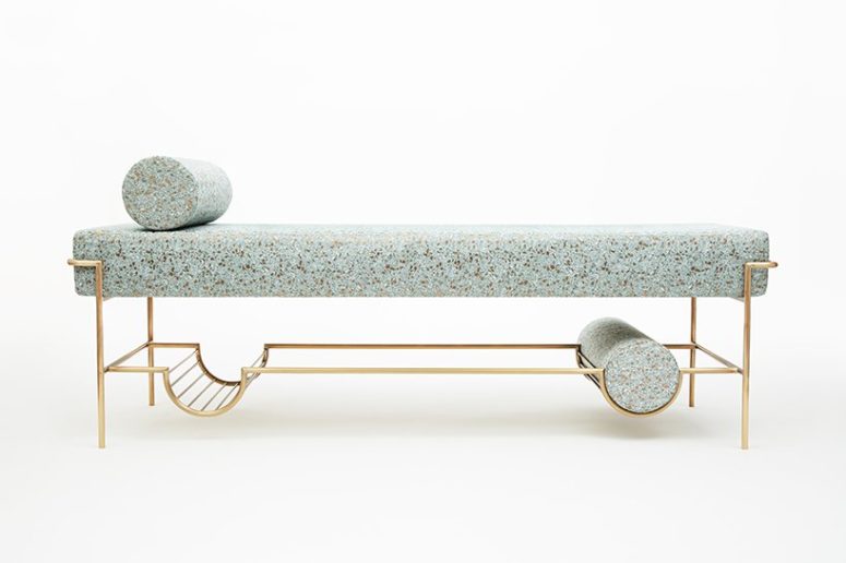 The Premonitions bench features elegant gold lines and terrazzo fabric that looks like real terrazzo