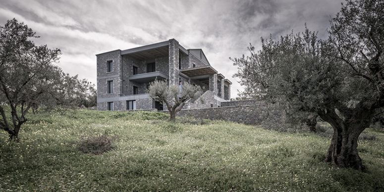 This beautiful home is standing in an olive grove on the outskirts of one of Greek cities