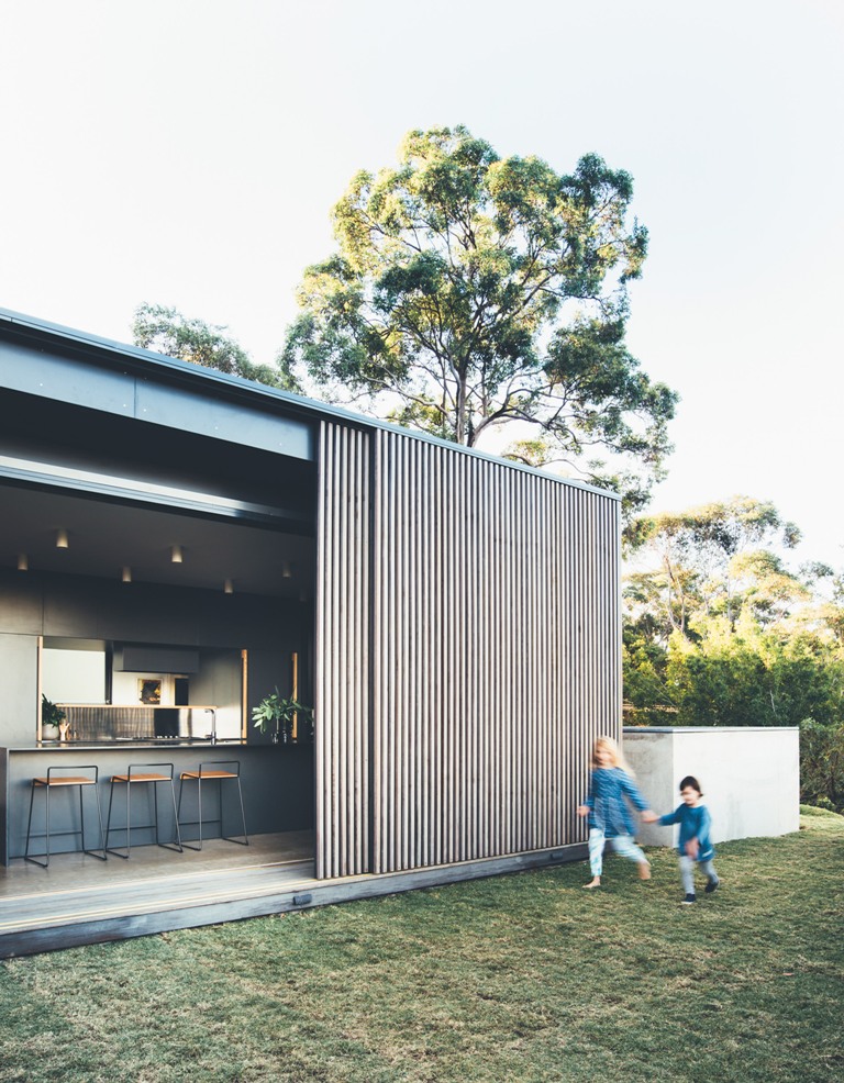 The screens can be pulled out to enjoy the views of the eucalyptus forests and ocean from the house