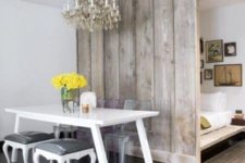 03 a rustic grey wooden screen makes the sleeping space more private and adds coziness to the shabby chic space