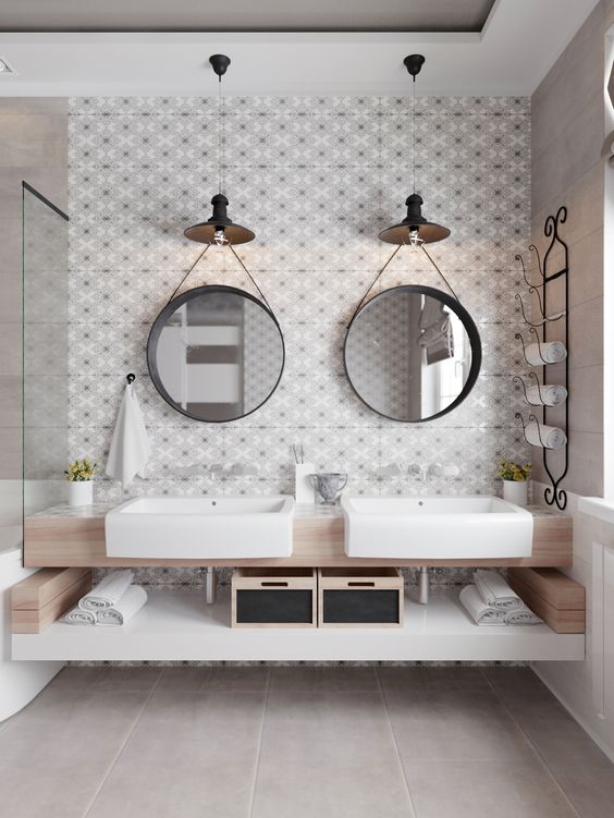 every mirror features a lamp, which is used as an accent and maybe task light, too
