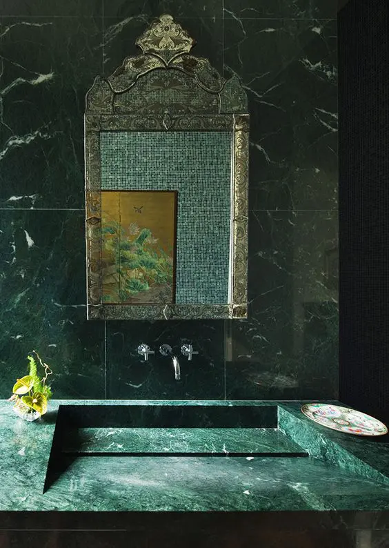 fabulous green marble sink with a minimalist design and matching green marble tiles for a stunning bathroom