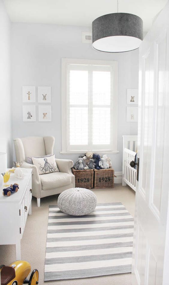 a striped rug doesn't dominate the space, and all the rest is off-white, which is perfect