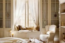 05 a warm and refined French country chic bedroom with a window seat