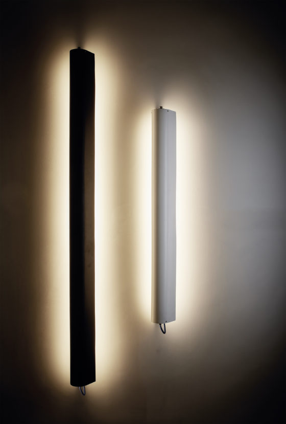 Flap lamps are available in various sizes and in classic black and white