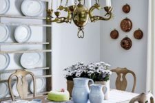 06 a a French country chic kitchen with ethereal shelves for plate display