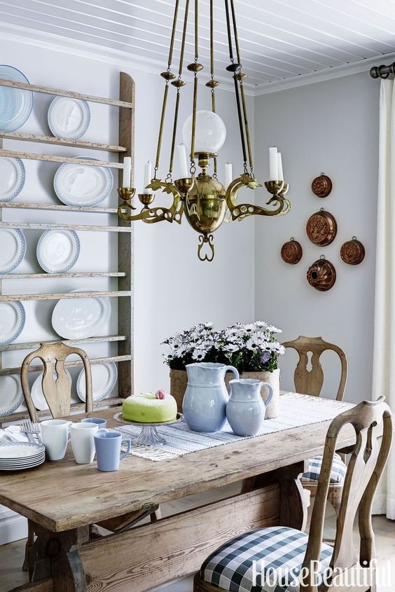 a a French country chic kitchen with ethereal shelves for plate display