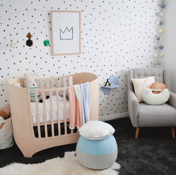 a polka dot wall is the only print here and it adds interest to the space