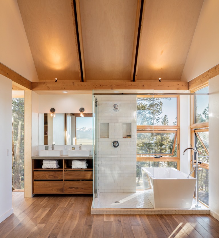 The bathrooms also feature amazing views, and the privacy is kept with the thick forest around the cabins