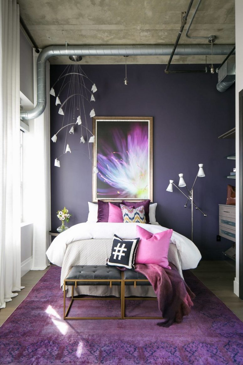 The daughter's bedroom is done in ultra violet, with a floral lamp, a floral artwork and touches of glam