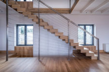 08 Windows everywhere provide cool views, there’s a modern staircase with creative railings