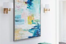 09 an oversized bright watercolor brushstroke artwork and a matching navy and copper upholstered bench