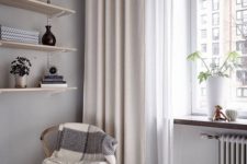 12 Neutral curtains hanging a bit over the floor for a lightweight and airy look in the room