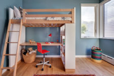13 The kids’ room is done in a creative way with a wooden bed up placed on shelving units and with a desk down