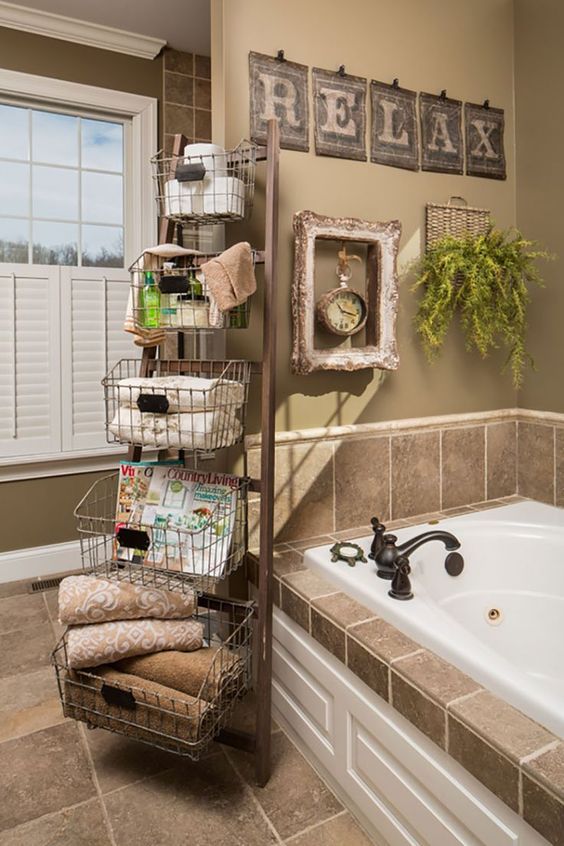 a ladder with wire baskets is a great idea that allows to accomodate a lot of things